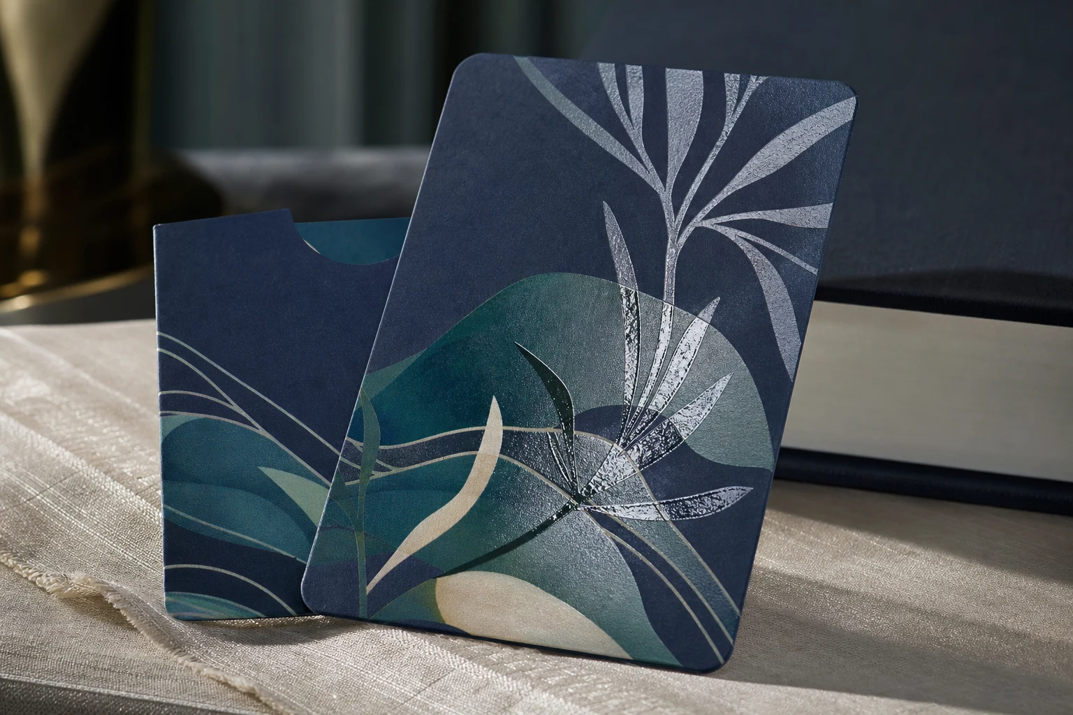 Midnight blue paper hotel key card with gloss UV and silver print details